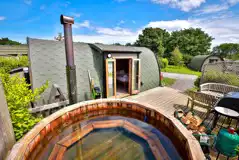 Elite plus ensuite glamping pod with a wood-fired hot tub Elite plus ensuite glamping pod with a wood-fired hot tub
