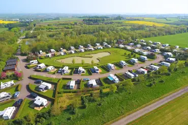 Aerial of the Northern Close area with a central fishing pond