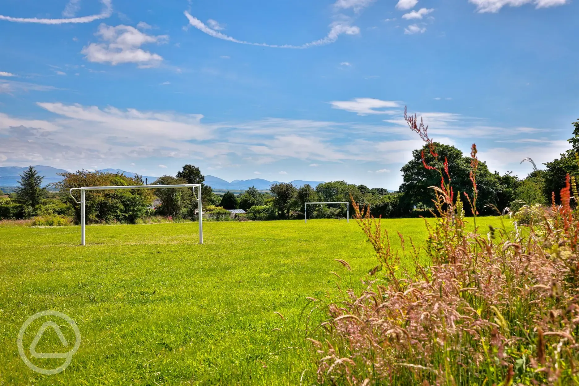 Football goal with view of mountains