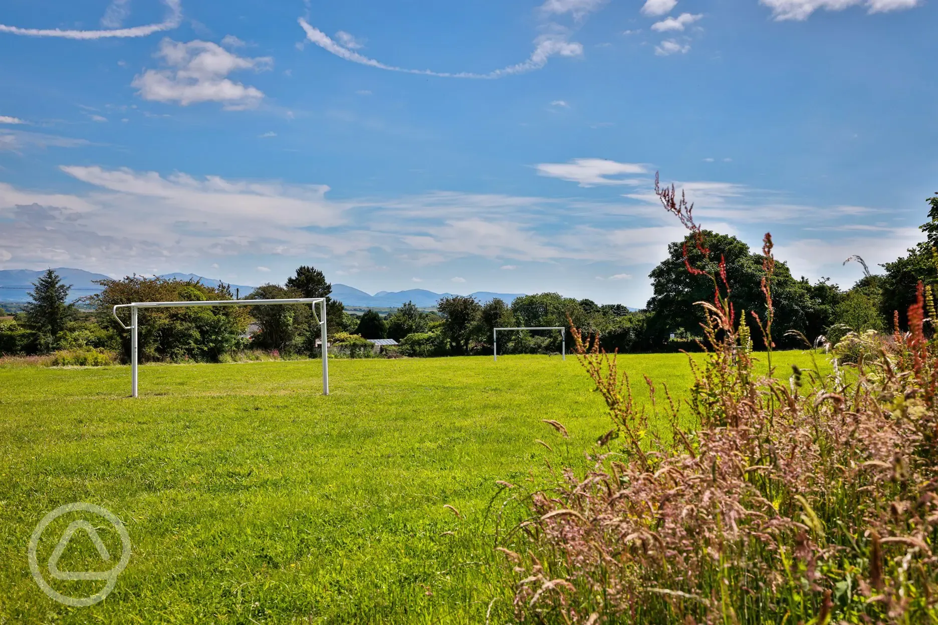 Football goal with view of mountains