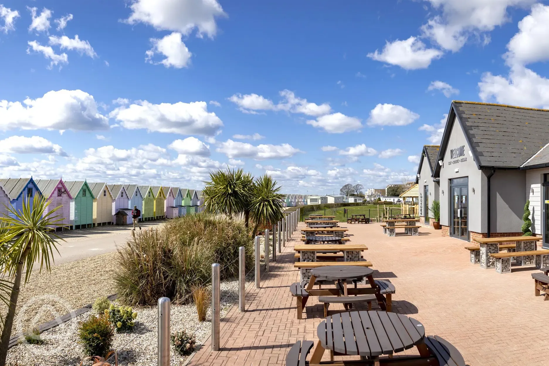 Onsite bar and restaurant with outdoor seating right on the beach