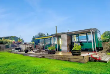 Eco bus (four person) with decking, outdoor furniture, and a hot tub