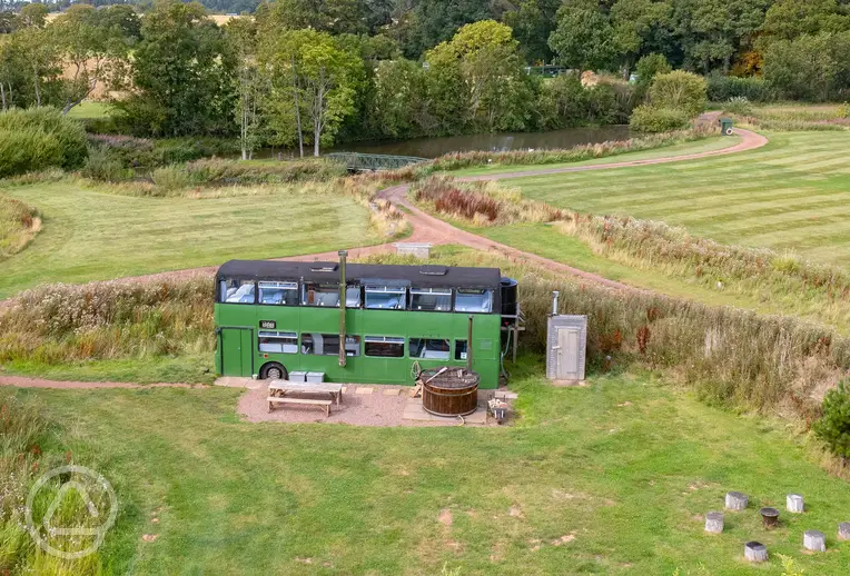 Eco bus (six person) with a hot tub and fire pit circle at The Bus Stop