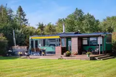 Luxury glamping bus (four person) with decking and outdoor furniture