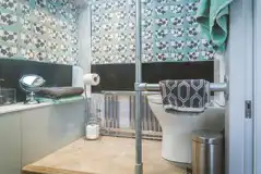 Luxury glamping bus (two person) ensuite with a rainfall shower and toiletries