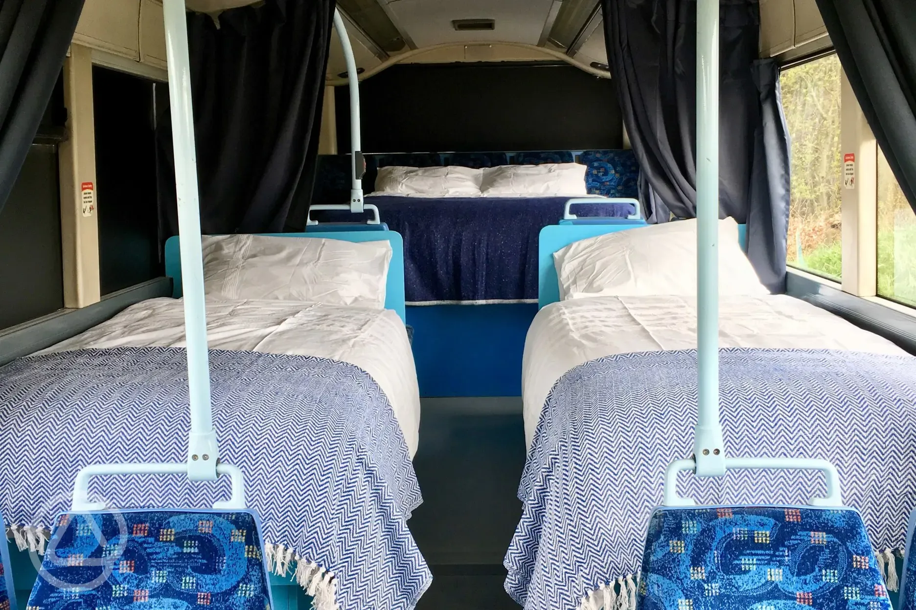 Eco bus (four person) twin beds with bedding provided
