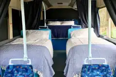 Eco bus (four person) twin beds with bedding provided