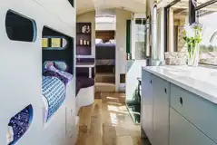 Luxury glamping bus (four person) interior with bunk beds