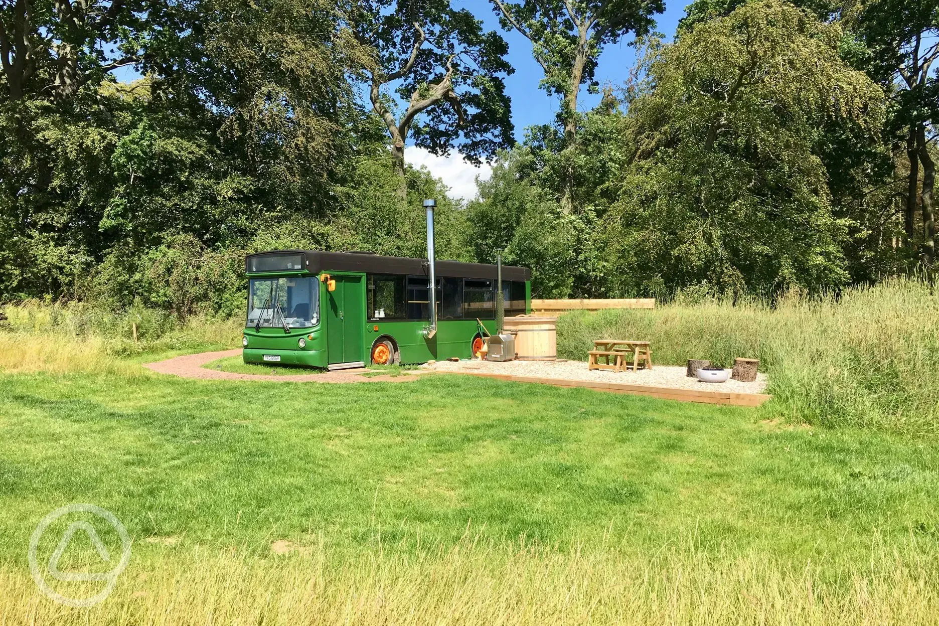 Eco bus (two person) with decking, outdoor furniture, and a hot tub