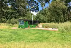 Eco bus (two person) with decking, outdoor furniture, and a hot tub