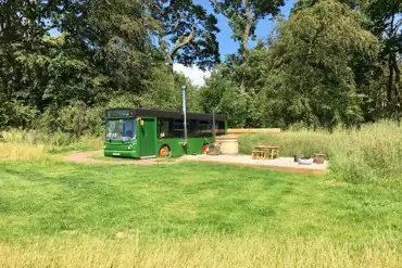 Eco bus (two person) with decking, outdoor furniture, and a hot tub