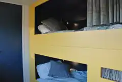 Luxury glamping bus (six person) bunk beds with bedding provided
