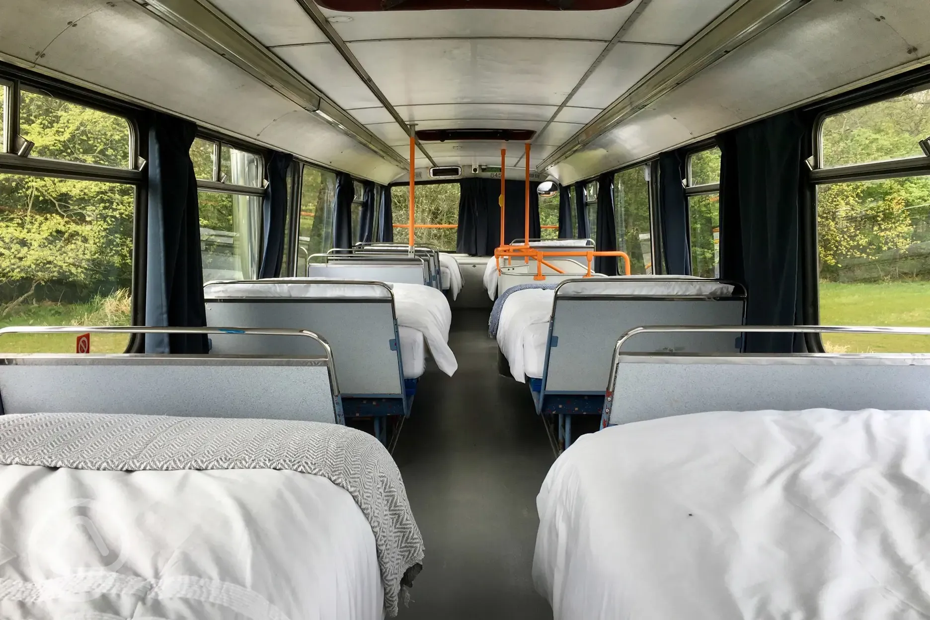 Eco bus (six person) with four single beds and one king size bed