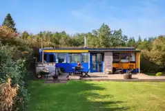 Luxury glamping bus (two person) with a fence, decking, hot tub, and seating Luxury glamping bus (two person) with a fence, decking, hot tub, and seating
