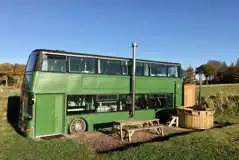 Eco bus (six person) with picnic bench and wood-fired hot tub