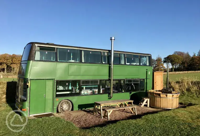 Eco bus (six person) with picnic bench and wood-fired hot tub