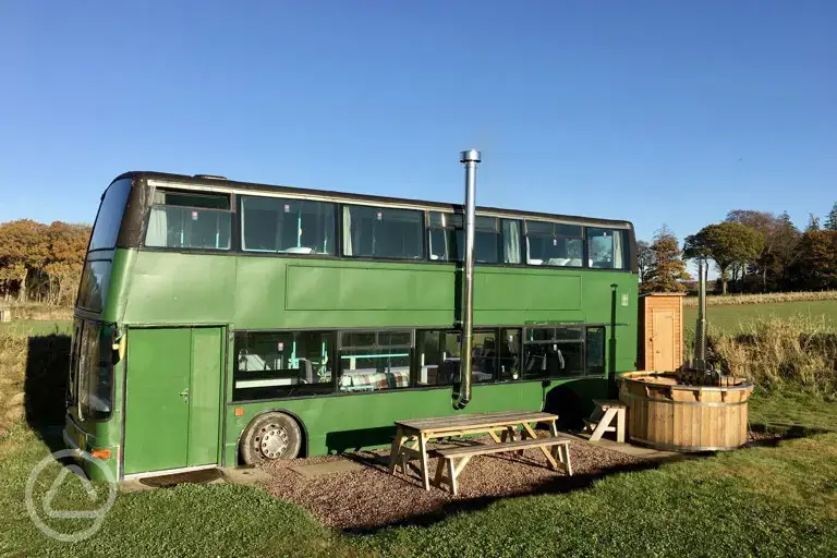 Eco bus (six person) with picnic bench and wood-fired hot tub