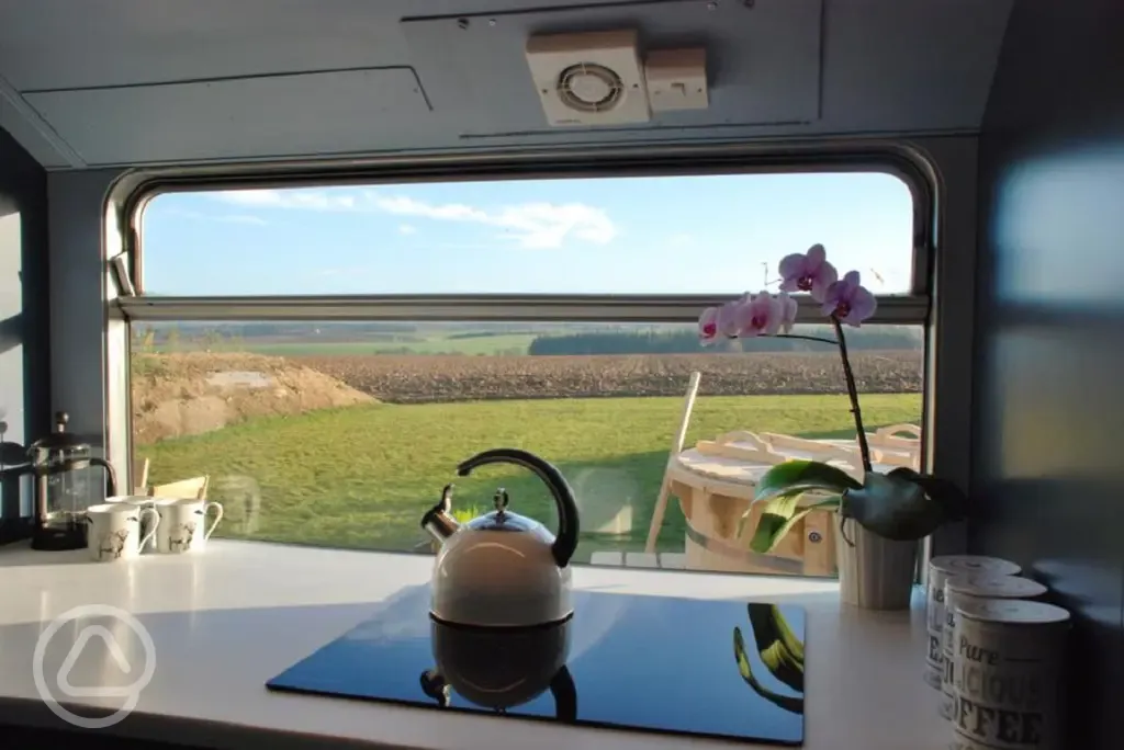 Luxury glamping bus (six person) views from the kitchen area