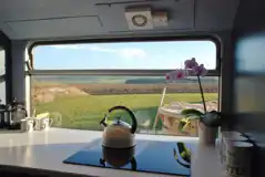 Luxury glamping bus (six person) views from the kitchen area