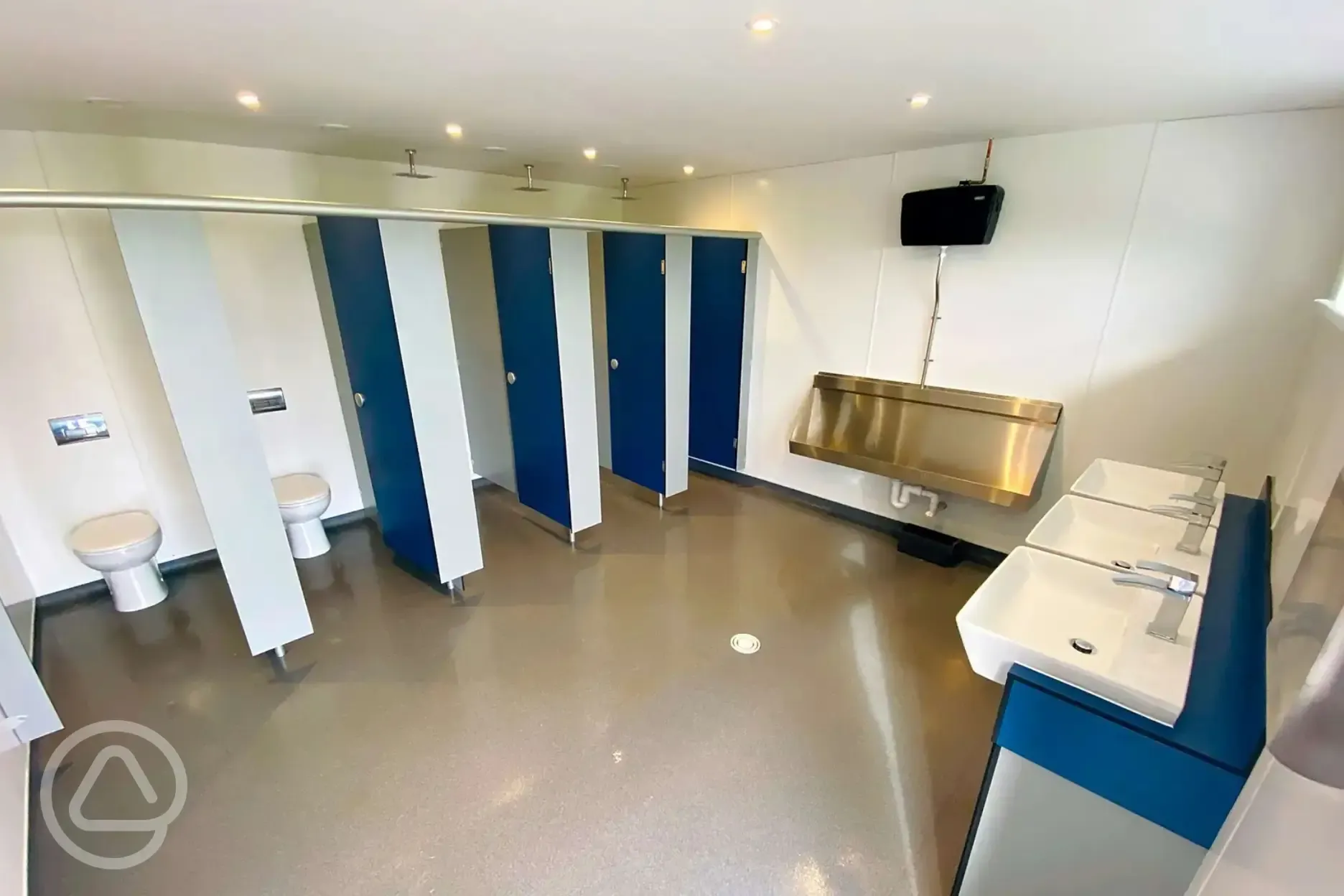 Men's toilets with cubicles and urinals