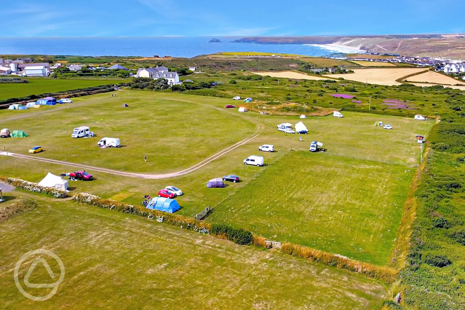 Aerial of Anchor Barrow Campsite with views to Perranporth and the coast