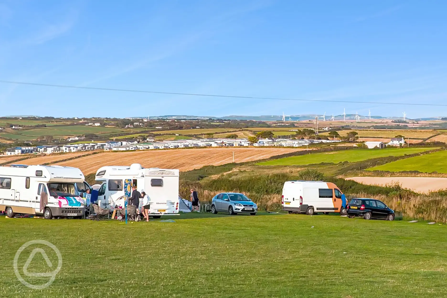Grass pitches at Perranporth with countryside views