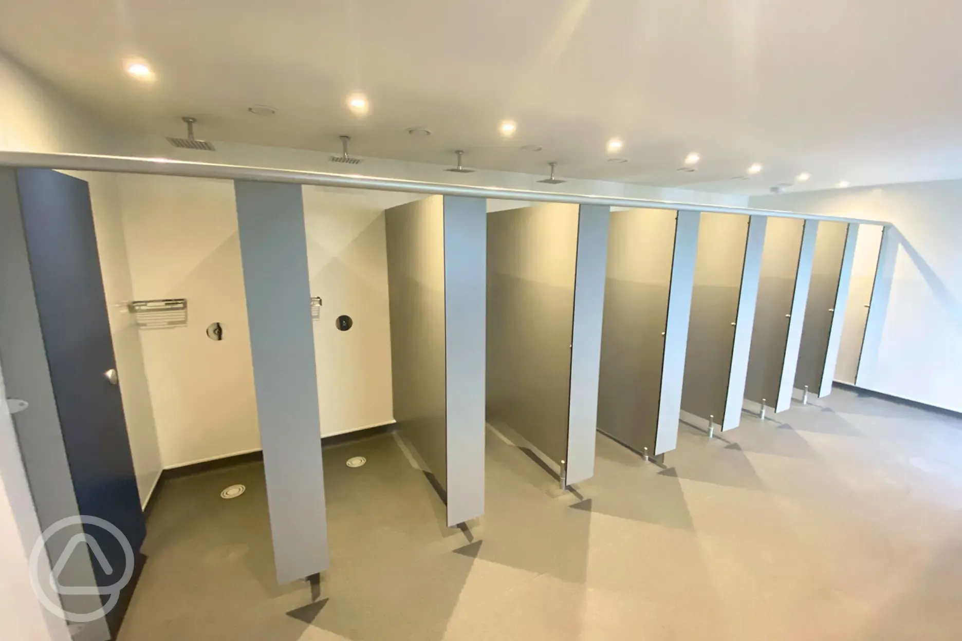 Shower cubicles with hot waterfalls showers