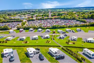Aerial of Folly Farm Holiday Park towards the adventure park