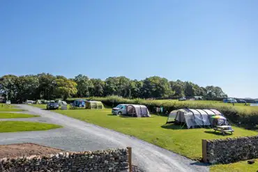 Electric grass tent pitches with 10 amp hook up 