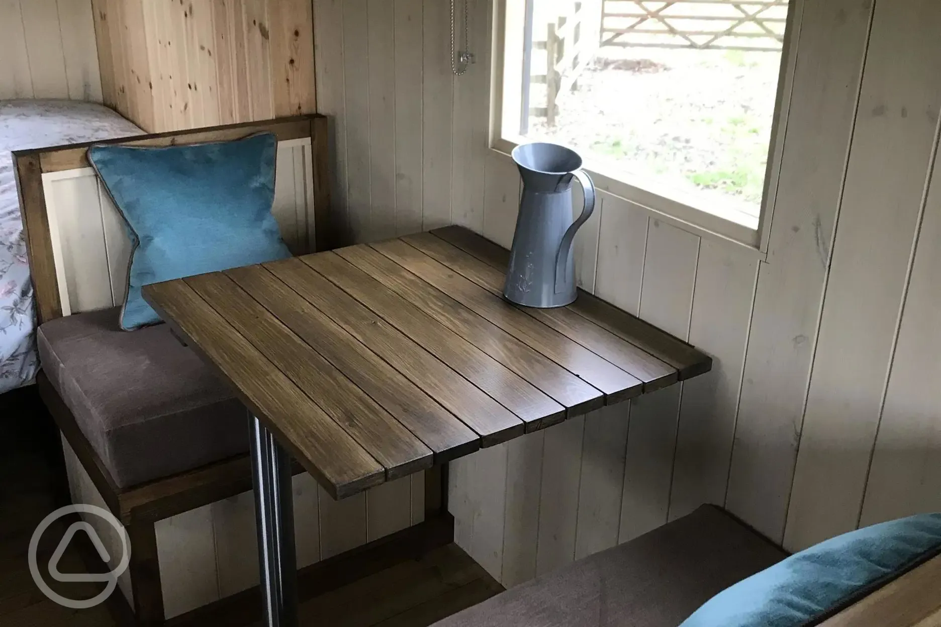 Table and Chairs that drop down to make a 6ft single bed.