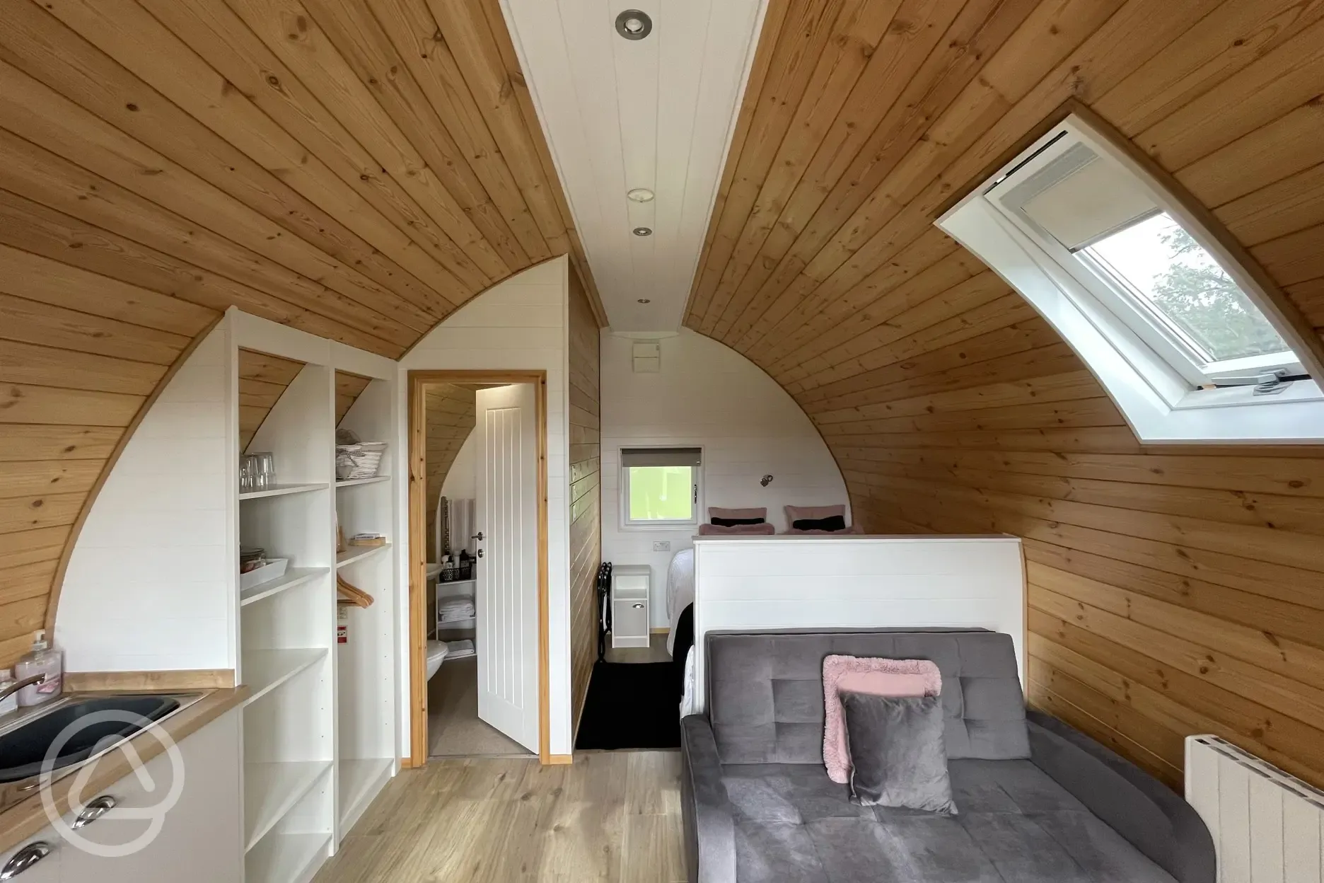 Rosy pod interior with king size bed 
