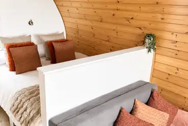 Rosy pod with a king size bed and double bed settee 