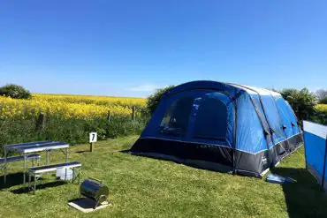 Grass tent pitch