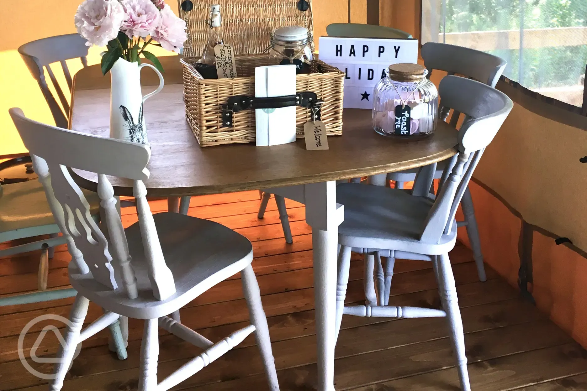 Safari lodge tent dining area and hamper 