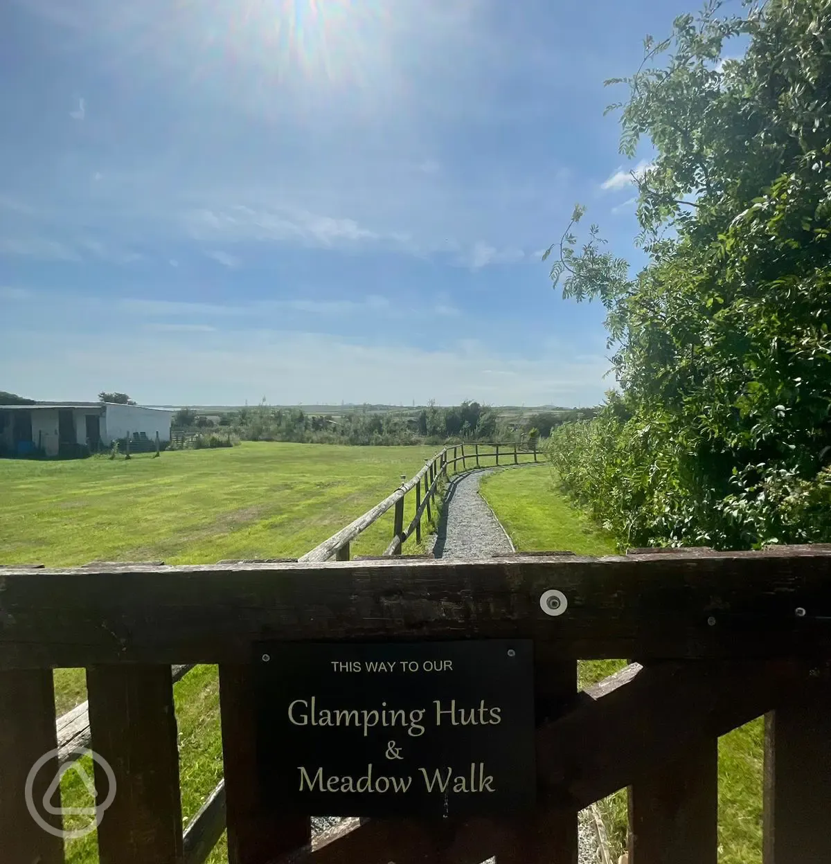 Glamping Huts and Meadow Walks Sign