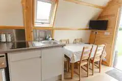 Ensuite Deluxe Wigwam Pod kitchen and dining area