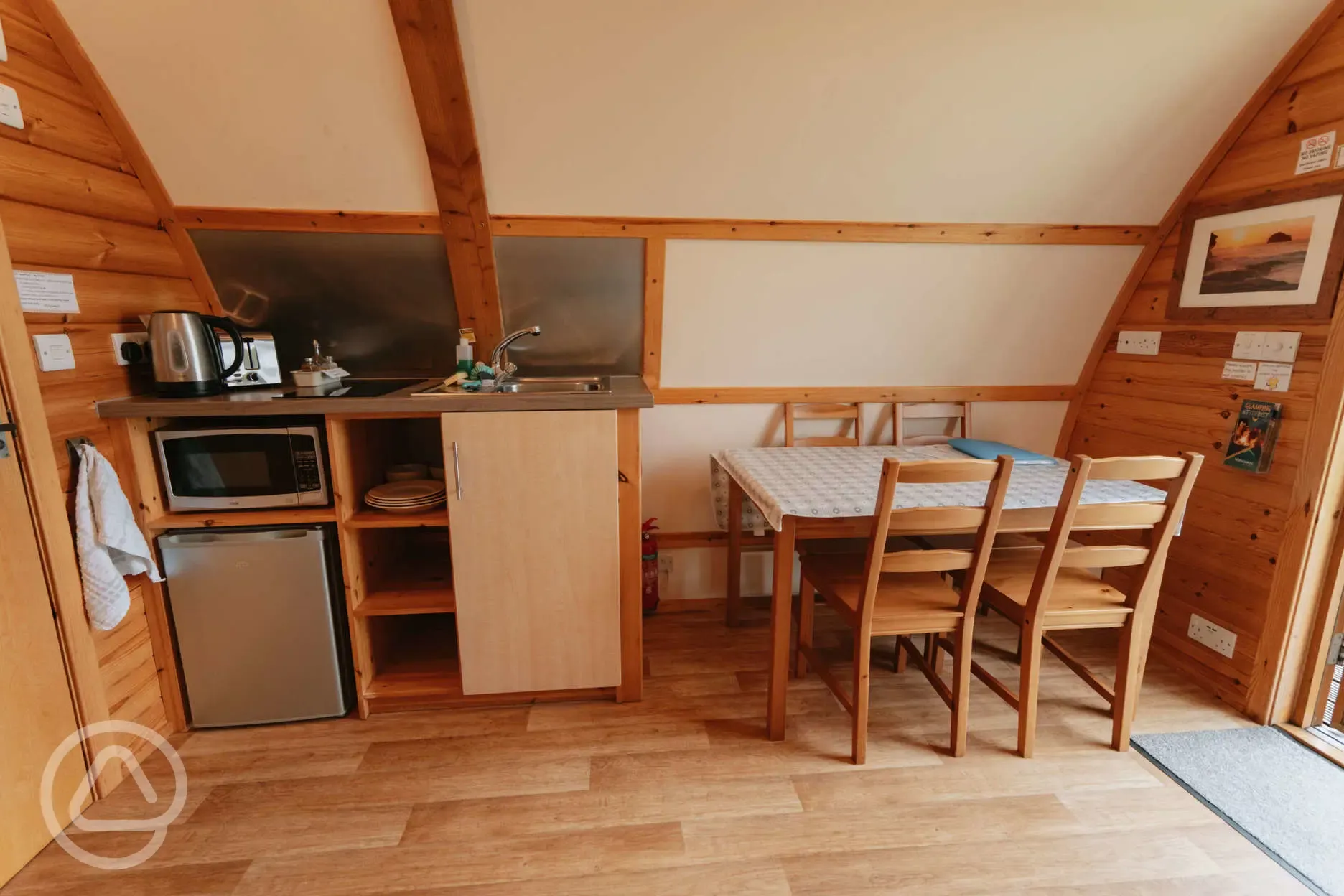 Wigwam pod kitchenette and dining area