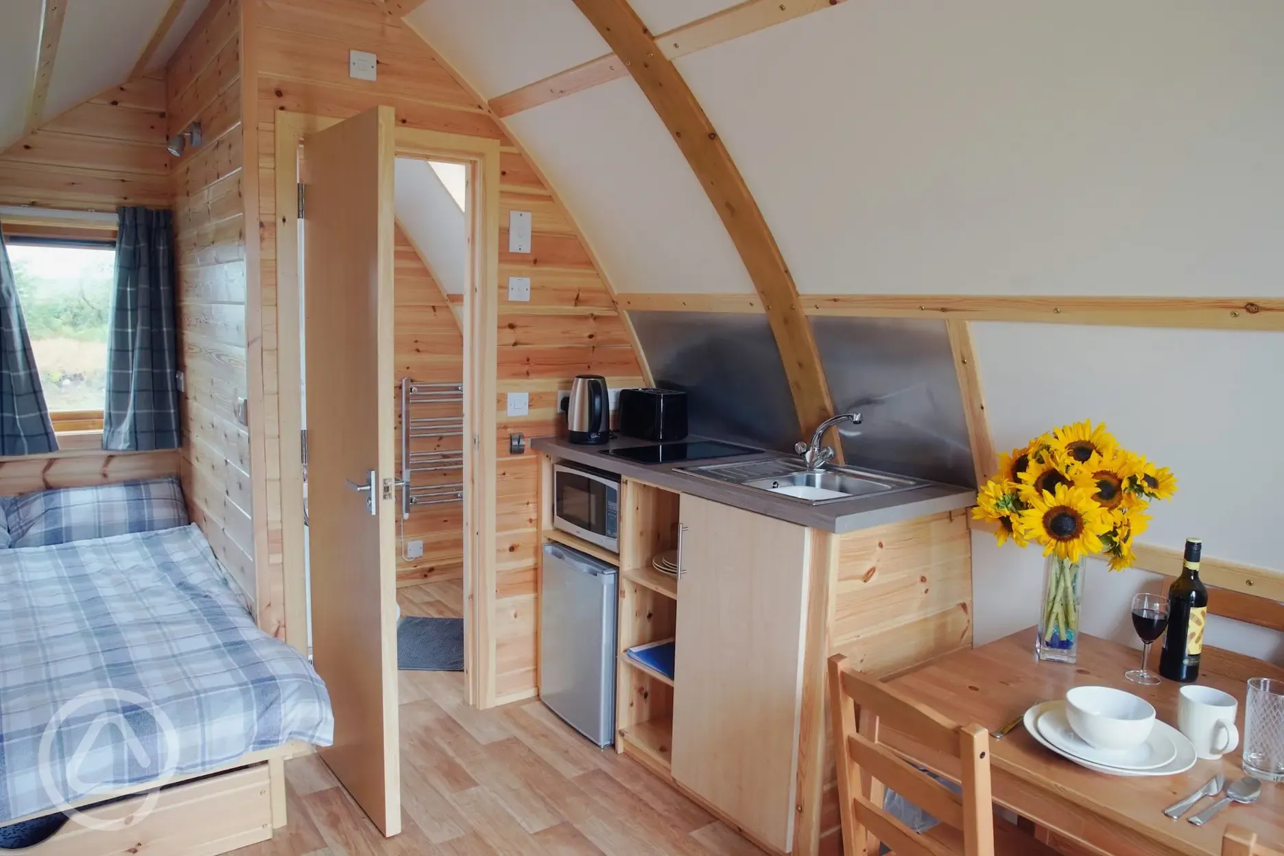 Wigwam pod kitchenette and dining area