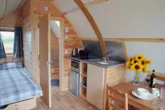 Wigwam pod kitchenette and dining area