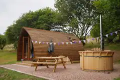 Wigwam pod with hot tub