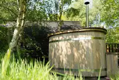 Wigwam pod with hot tub