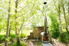 Wigwam pod with hot tub