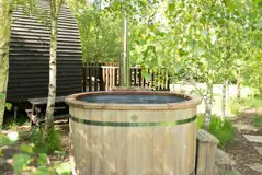 Wigwam pod with hot tub