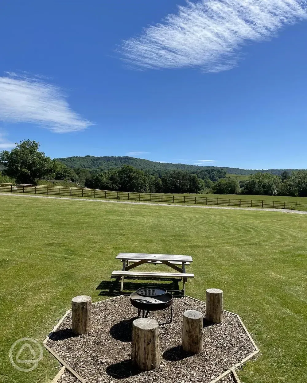 Wigwam pod fire BBQ and seating area