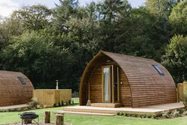 Wigwam pods with private hot tubs