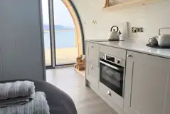 Sildvik and Sunset ensuite glamping pod interiors with a kitchenette