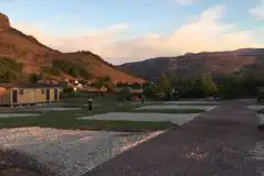 Hardstanding pitches (optional electric) at sunset with mountain views