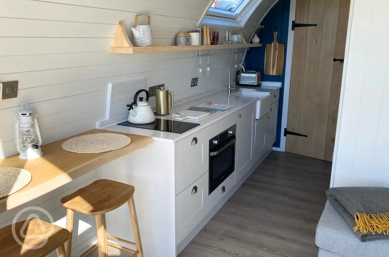 Sildvik and Sunset ensuite glamping pod interiors with a kitchenette Sildvik and Sunset ensuite glamping pod interiors with a kitchenette
