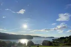 Hardstanding pitches (optional electric) with loch views Hardstanding pitches (optional electric) with loch views