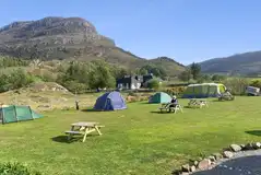 Grass tent pitches (optional electric) with loch views